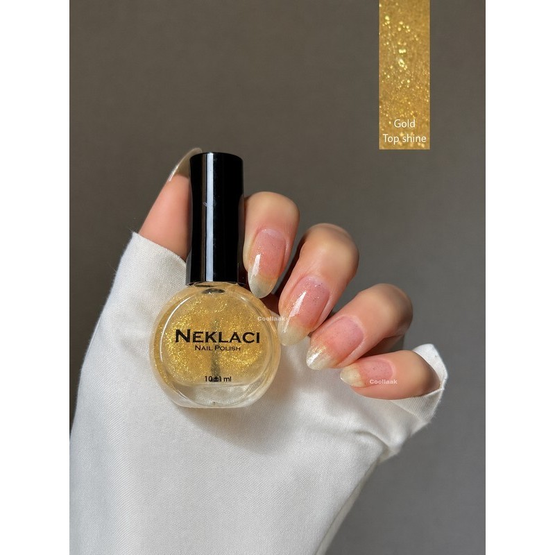 لاک ناخن نکلاسی مدل Gold Topshine